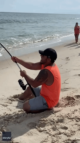 'Watch Your Feet!' Man Reels in Shark on Long Island Beach