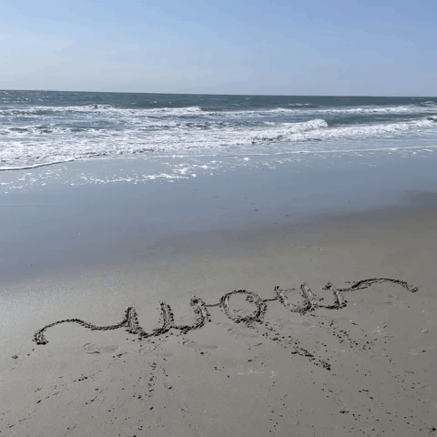 Sand Calligraphy writing βWowβ