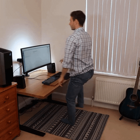 adaptnetwork giphygifmaker working from home standing desk GIF