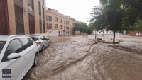 Cars Swept Away as Flooding Inundates Streets in Central Spain
