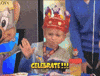 Video gif. A little boy in a Chuck E. Cheese birthday crown dances in celebration. Text, “Celebrate!!!”
