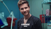 the resident smile GIF