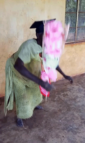 Overjoyed Ugandan Mom Dances in Celebration