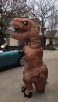 'Wine-O-Saur' Stomps Through Cleveland, Delivering Wine Amid COVID-19 Pandemic