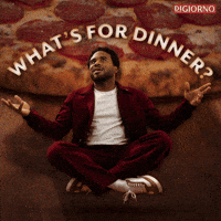 Sponsored gif. Man sits with his legs crossed and his hands held open at his sides. He looks above him with a happy expression on his face. In the background, a pepperoni pizza is placed down. Text reads, “What’s for dinner?”