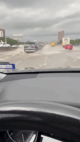 Drivers Navigate Flooded Highway as Severe Storm Brings Heavy Rain to Dallas