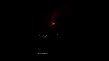 Mount Etna Erupts, Sending Lava and Smoke Into Night Sky