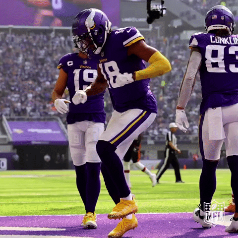 Sports gif. Justin Jefferson from NFL's Minnesota Vikings does a celebratory dance in the end zone after scoring.
