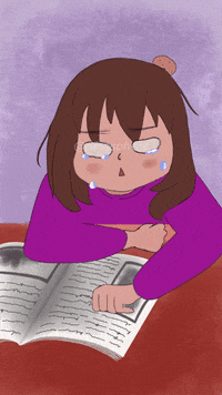 Illustrated gif. A girl sits at a table with a book in front of her. She looks down at the book and sobs, tears streaming down her face.