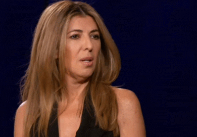 Celebrity gif. Nina Garcia shakes her head slowly with a look of mild disapproval.