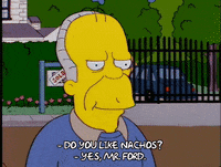 homer simpson laughing GIF