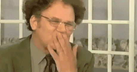 TV gif. John C. Reilly on Check It Out! with Dr. Steve Brule. He smiles cheekily and blows us a kiss. A little pink heart flies out from his lips.