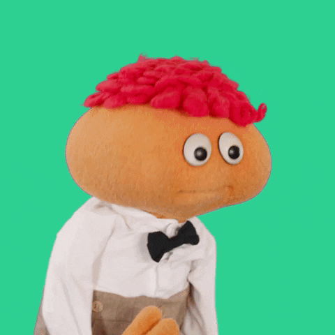 TV gif. Gerbert the puppet purses his lips and rubs his chin as he says, "Hmm."