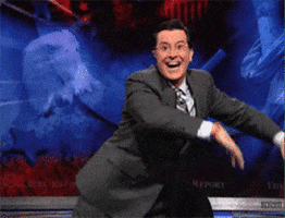 Excited Stephen Colbert GIF