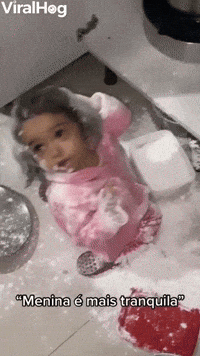 Little Girl Makes a Mess with Flour  