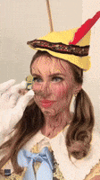 Woman Creates Pinocchio Nose Using Tampon Applicator for Halloween Costume