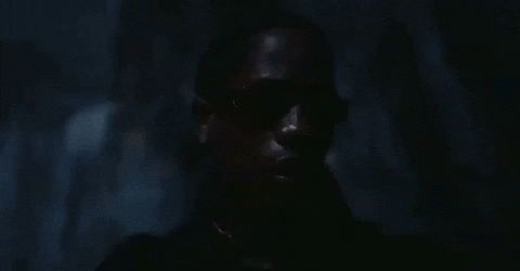 Staring Travis Scott GIF