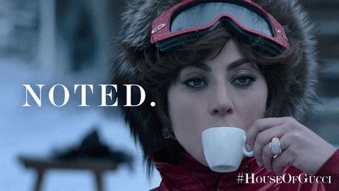 Movie gif. Lady Gaga as Patrizia in House of Gucci. She sips an espresso outside, looking calm and powerful. Text, "Noted."