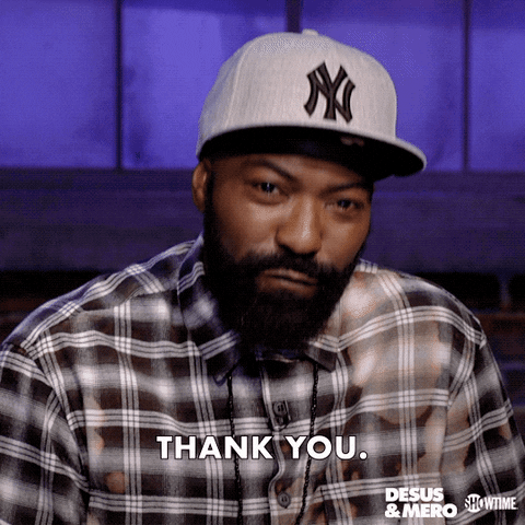 TV gif. Desus Nice of Desus and Mero gives a thumbs up and extends his arm forward while saying "thank you."