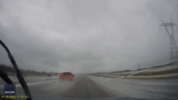 Pick Up Truck Slides Off Texas Highway Amid Icy Conditions