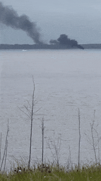 2 People, Dog Escape Boat Fire on Mississippi Reservoir