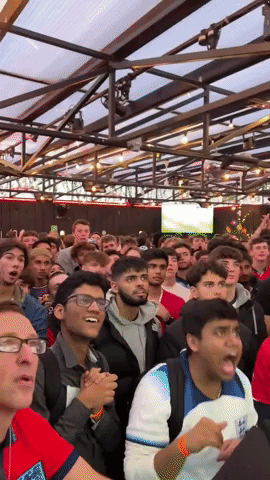 England Fans Cheer as Goals Fly in Against Iran