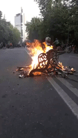 Street Fires Burn as Demonstrators Flock to the Streets of Santiago for Thirteenth Day
