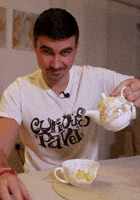 Curious Pavel pours tea