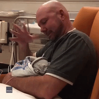 Deaf Man Signs to His Newborn Deaf Daughter