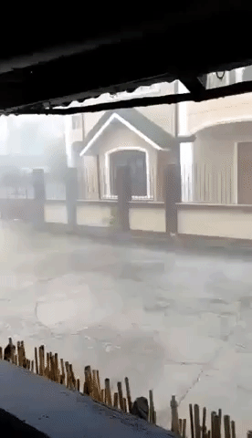 Locals Held Up by Powerful Winds While Walking During Typhoon Vongfong