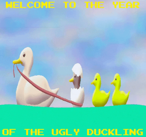 Digital art gif. Mother duck pulls a boat full of her chicklings. One of the chicks is a black duck and the eggshell is still on its head. The text reads, "Welcome to the year of the ugly duckling."