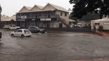 Motorists Drive Through Floodwaters in Broome