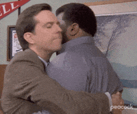 The Office gif. Ed Helms as Andy gives a tender hug to an unemotive Craig Robinson as Darryl Philbin. Darryl remains still as Andy rests his head on his shoulder.