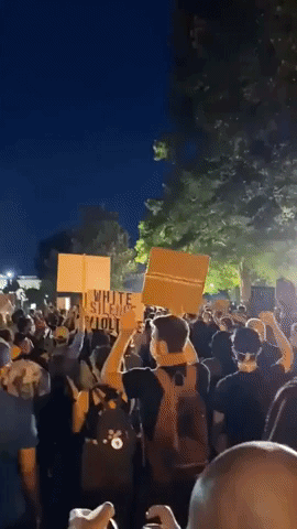 Protesters Sing Lean on Me Outside White House