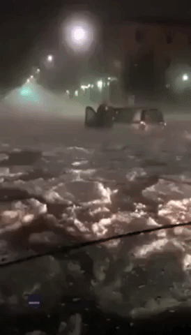 Car's Occupants Trapped During Major Hailstorm in Rome
