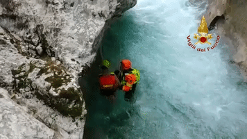 Firefighters Rescue Man and Dog From Treacherous Ravine