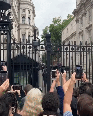 Crowds Gather Outside 10 Downing Street Amid British Prime Minister's Resignation