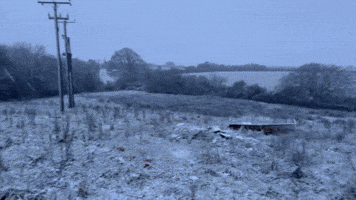 Snow Dusts English Countryside Amid Weather Warnings