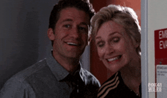 Amused Jane Lynch GIF