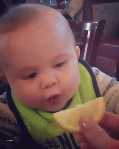 Baby Not Impressed By The Taste Of Lemons