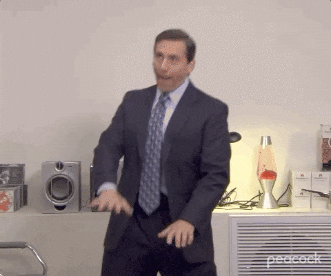 Michael Scott dancing in celebration