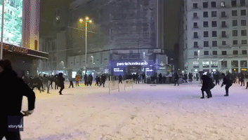 Crowd Stages Snowball Fight in Madrid as Storm Filomena Hits Spain