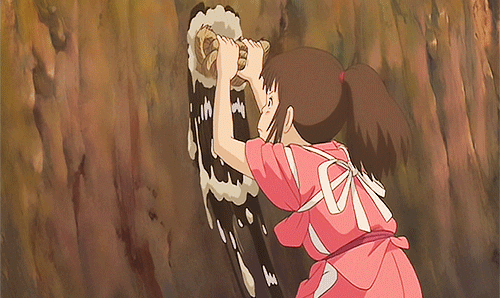 Animation gif. Chihiro from Spirited Away is scrubbing vigorously at a wall. Suds from her sponge flow down the wall and her face is furrowed in concentration.