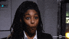 TV gif. Jessica Williams is on the Daily Show with Trevor Noah. She looks completely shocked as she grins and drops her jaw, staring at us open-mouthed but excited.