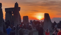 Large Crowd Gathers for Solstice Sunrise at Stonehenge for First Time Since Pandemic Started
