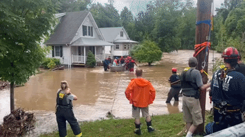 Elderly Man Rescued as New York Home Surrounded by Floodwater
