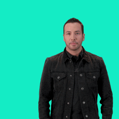 Video gif. Howie D of the Backstreet Boys stands against a solid cyan background, wearing a black jacket over a black shirt. He spreads his arms dramatically to ask us a question, and a thought balloon appears next to his head. Text, "Tell me why?"