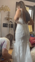 Bride-to-Be in Tears as Mother Stitches Piece of Late Father's T-Shirt to Wedding Dress