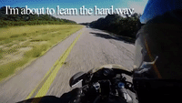 Motorcyclist Realizes His Luggage Is Bouncing Off His Rear Tire