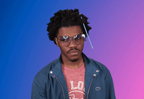 Celebrity gif. Smino takes a deep breath and sighs, shaking his head. He tosses a hand up in disappointment and walks away.